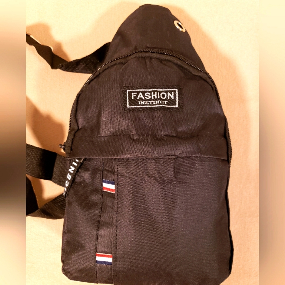 SLING OVER THE SHOULDER BAG